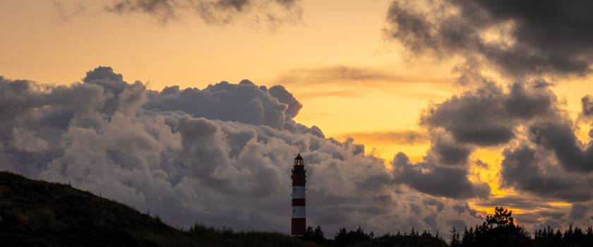 Lighthouse Framed by Clouds