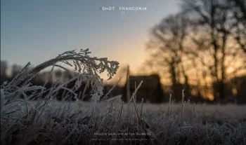 Frozen meadow after sunrise
